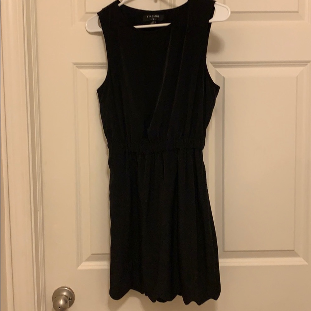 Mini black dress with open back